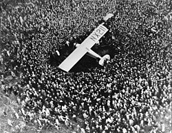 The Spirit mobbed by a crowd at Croydon Air Field in South London on May 29, 1927[99]