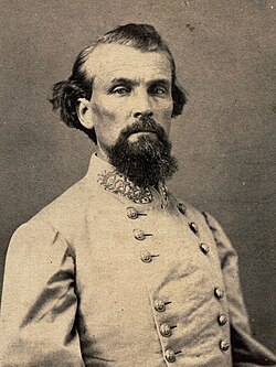 Nathan Bedford Forrest, first Grand Wizard of the Klan, pictured in 1864 wearing his Confederate uniform