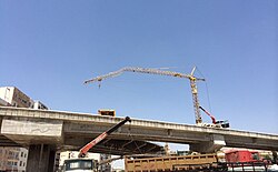 This crane's main jib failed due to an overload.