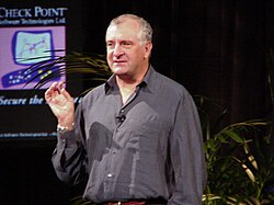 Adams speaking at the Internet Security Conference in March 2000