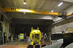 An EOT overhead crane is used to move and build the Ictineu 3 submersible, in a warehouse of Sant Feliu de Llobregat.