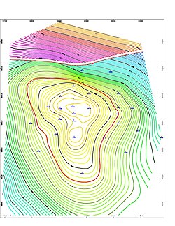 Screenshot of a structure map generated by geological mapping software for an 8500 ft deep gas and oil reservoir in the Erath field, Vermilion Parish, Erath, Louisiana. The left-to-right gap, near the top of the contour map indicates a Fault line. This fault line is between the blue/green contour lines and the purple/red/yellow contour lines. The thin red circular contour line in the middle of the map indicates the top of the oil reservoir. Because gas floats above oil, the thin red contour line marks the gas/oil contact zone.