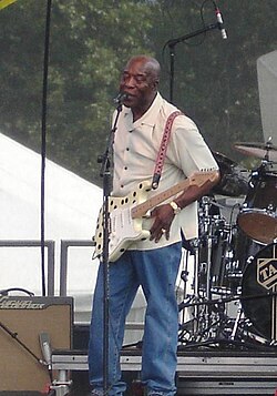 Guy performing at the Bonnaroo Music Festival in 2006