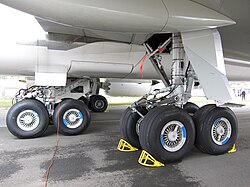 The retractable main landing gear of a Boeing 747-8