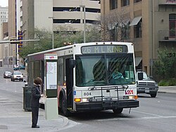 A VIA bus, stopped at a Downtown San Antonio intersection