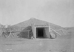 Mandan earth lodge, photographed by Edward S. Curtis, circa 1908