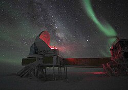 South Pole telescope during polar night. The green light is the southern lights