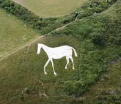 The Litlington White Horse, a hill figure created by exposing the natural whiteness of the chalk bedrock.