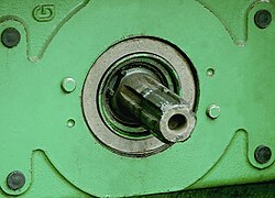 A PTO at the rear end of a farm tractor
