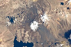 Parinacota volcano in the centre. Upper right is Pomerape, left are the Cotacotani Lakes and the avalanche deposit and the black structure below the middle is Lake Chungará