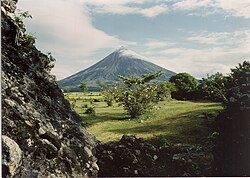 Mayon Volcano overlooks a pastoral scene about five months before the volcano's violent eruption in September 1984.