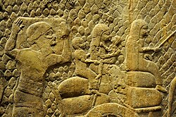 Judaean prisoners being deported into exile to other parts of the Assyrian Empire. Wall relief from the Southwest Palace at Nineveh, Mesopotamia, dated to 700–692 BCE (the Neo-Assyrian period). Currently on display at the British Museum.
