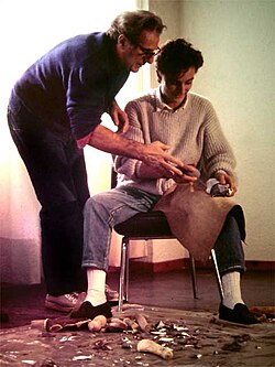 French prehistorian Jacques Tixier offers modern training in stone knapping.