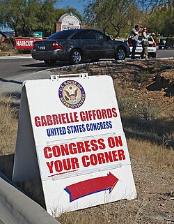 Roadside sign at the scene of the shooting