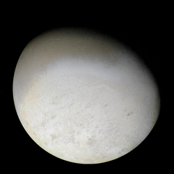 Color image of Triton, showing its varied surface.
