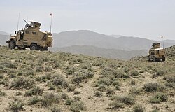 Albanian special operations forces provide security for coalition forces at an Afghan Border Police checkpoint near the Afghanistan-Pakistan border in the Spin Boldak district of Kandahar province, Afghanistan, April 1, 2013.