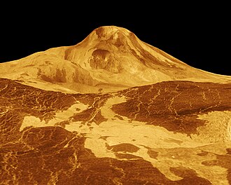The second highest mountain and highest volcano of Venus, the 8-km-high (5-mile-high) volcano Maat Mons, is displayed in this perspective view of the surface of Venus, with the vertical scale multiplied by 22.5. Based on Magellan radar images. In the foreground, long lava flows are visible.