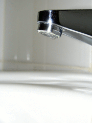 A water drop falling from a tap