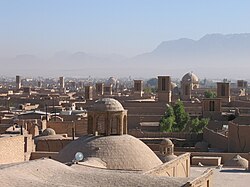 Wind towers and domes form part of the skyline of Yazd.