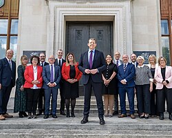 Rhun ap Iorwerth surround by members of his cabinet