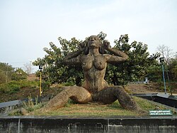 Statue of Yakshi by Kanayi Kunjiraman at Malampuzha Dam, Kerala
