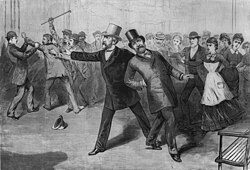 Garfield, shot by Charles J. Guiteau, collapses as Secretary of State Blaine gestures for help. Engraving from Frank Leslie's Illustrated Newspaper.