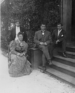 Booker T. Washington with his third wife Margaret and two sons, Ernest, left and Booker T. Jr., right