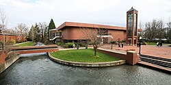 The Mark Hatfield Library and stream on the campus of Willamette University