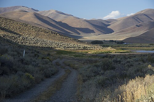 Goodale's Cutoff of the Oregon Trail at Lava Lake, west of Arco, Idaho and east of Carey, Idaho along US 26, 20, 93. Picture of current two tracks along a section of the cutoff of the Oregon Trail.