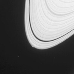 The possible formation of a new moon was captured on April 15, 2013.