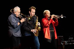 Chicago's horn section, 2024 (left to right: James Pankow, Ray Herrmann, Lee Loughnane)
