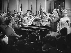 Benny Goodman (age 34) and Peggy Lee (age 23) from the film Stage Door Canteen (1943).