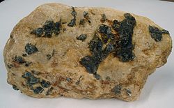 Pegmatite with blue corundum crystals