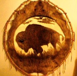 An Uncompahgre Ute shaved beaver hide painting, made by trapping beavers and shaving images into the stretched and cured hides. They have used these paintings to decorate their personal and ceremonial dwellings.