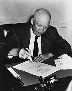 President Dwight D. Eisenhower signing the Civil Rights Act of 1957 on September 9, 1957