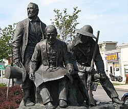 Jim Bridger (right) honored along with Pony Express founder Alexander Majors (left) and Kansas City founder John Calvin McCoy at Pioneer Square in Westport in Kansas City