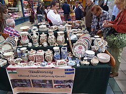 Traditional styles of faience pottery from Székely Land, now in Romania, on sale in Budapest, Hungary in 2014. A conventional idea of folk art, though no doubt made in quasi-industrial conditions.