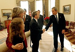 President George W. Bush congratulates Senator Mike DeWine on the passing of the Pediatric Equity Research Act of 2003