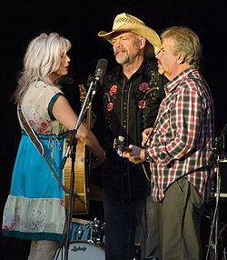 Harris performing onstage in Seattle, Washington with Phil Madeira and Ricky Simpkins, 2008.
