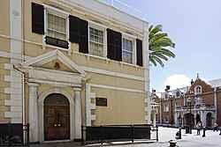 Government of Gibraltar headquarters at No. 6 Convent Place with The Convent in the background.