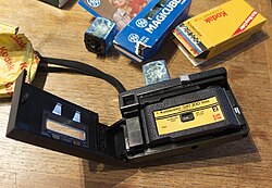 Kodak Instamatic X-15 with open door and loaded 126 film cartridge