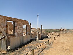 Stone ruins of buildings in the arid landscape of Farina, South Australia