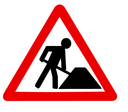 "Road works ahead" sign, typically used in Europe