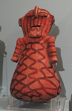Mohave ceramic figurine with red slip and earrings, pre-1912, Peabody Museum of Archaeology and Ethnology
