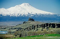 An ancient orthodox church known as St. Analipsis on Analipsis Hill, with Mount Hasan in the background. The Melendiz River can be seen in the bottom left.