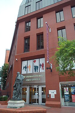 The Co-operative Bank's head office in Manchester. The statue in front is of Robert Owen, a pioneer in the cooperative movement.