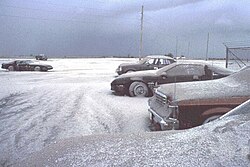 Snow-like blanket of Mount Pinatubo's ashfall deposits in a parking lot on Clark Air Base (15 June 1991)