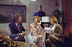 Ford in November 1975, sitting at the Hay–Adams Hotel with television producer Ed Weinberger and actress Mary Tyler Moore during the filming of Ford's cameo appearance on The Mary Tyler Moore Show