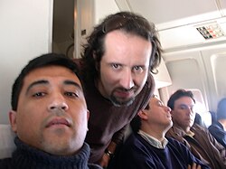Miguel Tapia (middle) on a plane bound for a fan Iquique in 2004.