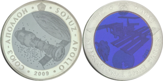 Bimetallic coins minted by the Bank of Kazakhstan with silver ring and tantalum center. These two feature the Apollo–Soyuz and the International Space Station